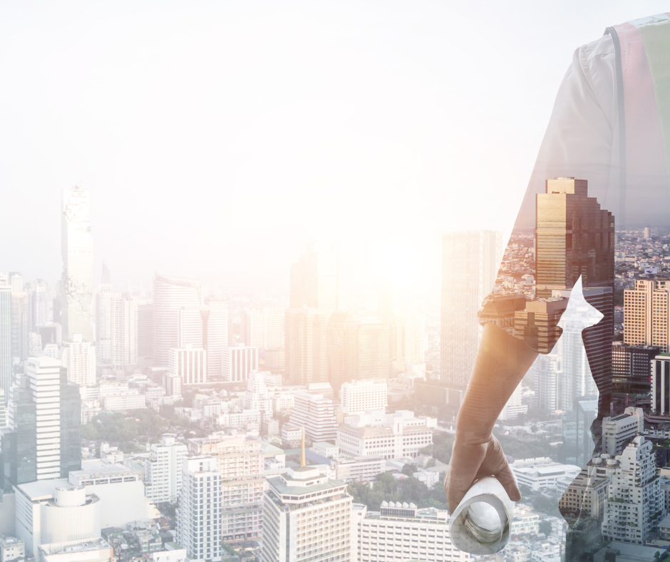 Architetto con i progetti per costruire gli edifici del futuro.